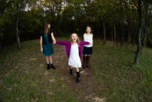 Sisters playing in the woods near Trophy Club Southlake Texas