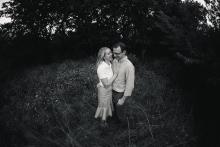 Parents couple in a field by Keller Southlake Westlake Trophy Club family photographer Sunny Mays