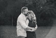 Black and white image of loving couple in a park near Trophy Colleyville Texas by best family photographer