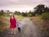 Colorful image of girl in red dress and her little brother near Southlake Keller Texas 