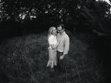 Parents couple in a field by Keller Southlake Westlake Trophy Club family photographer Sunny Mays