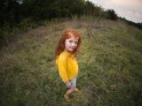 Creative and colorful image of a little girl in a Texas field