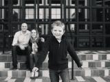 Fun black and white urban family image during family photo shoot in Dallas by best photographer and videographer in Southlake Texas area
