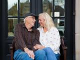 Loving couple during in-home family lifestyle photo shoot