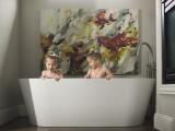 Photojournalistic documentary color image of Twin girls in a bath